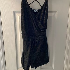 Sparkly romper with criss cross back